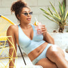 Parfait Lingerie Rita longline bikini top with cross back straps and shirred contour cups in Dream Blue.